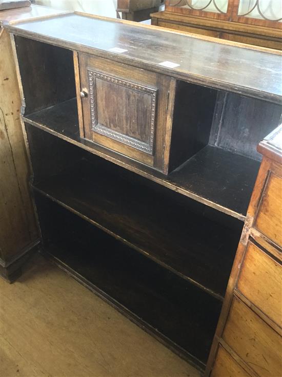 Oak open fronted bookcase(-)